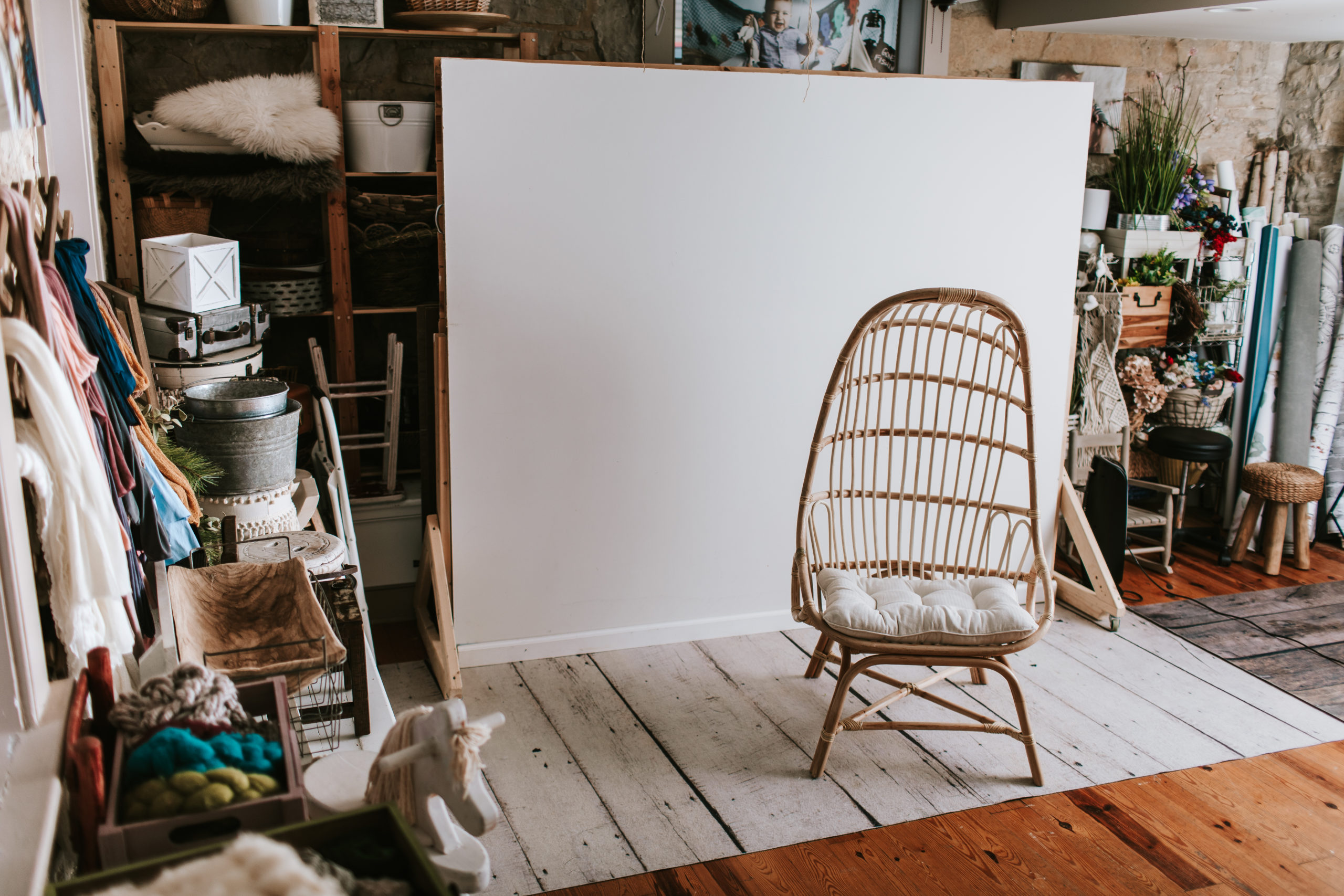 Wicker chair and neutral wall used in photography. Photogenics on Location 63090